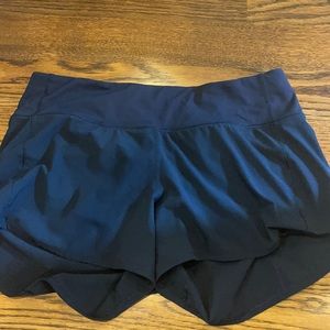 Navy lululemon speed up shorts tall